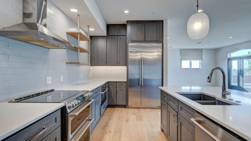 CrewPros kitchen with custom cabinets.